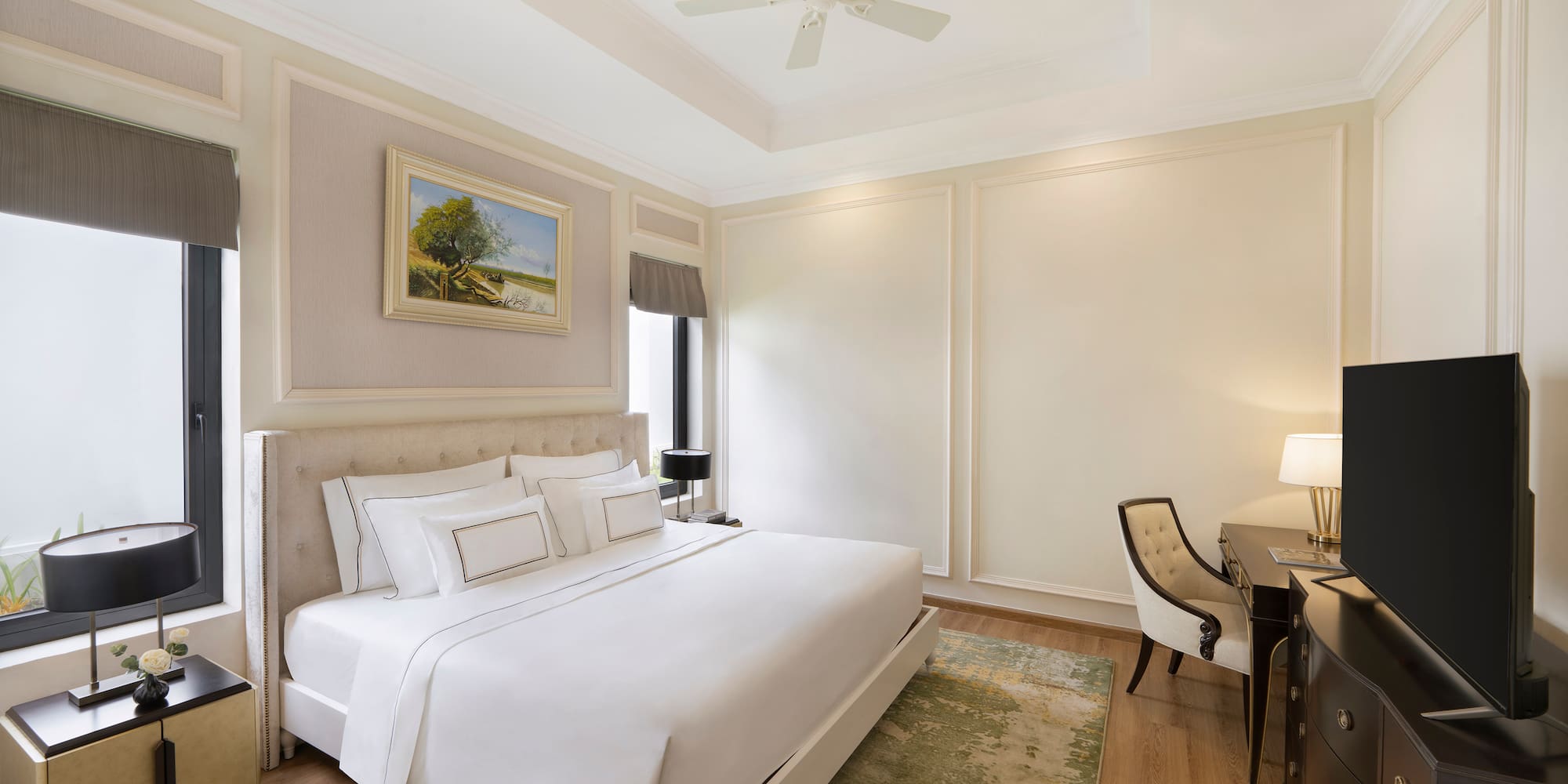 a room with a bed and desk