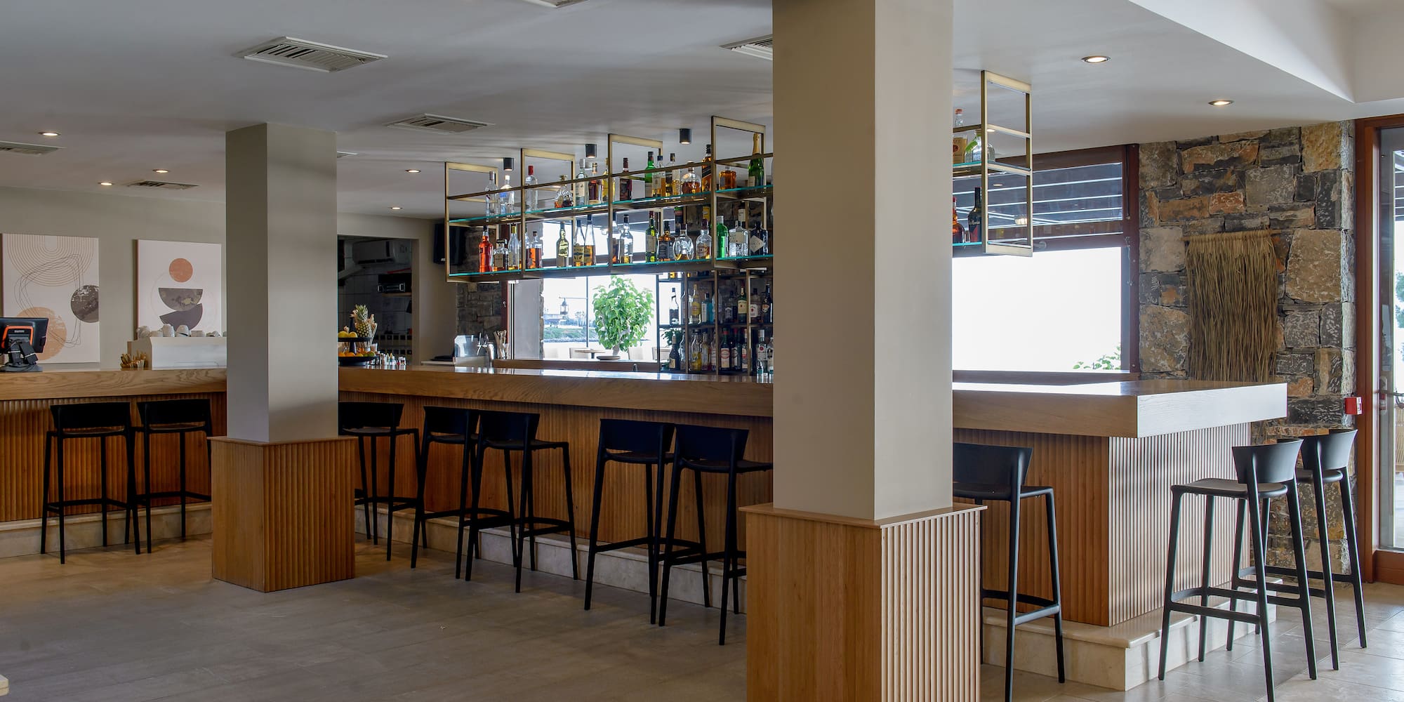 a bar with a shelf of liquor