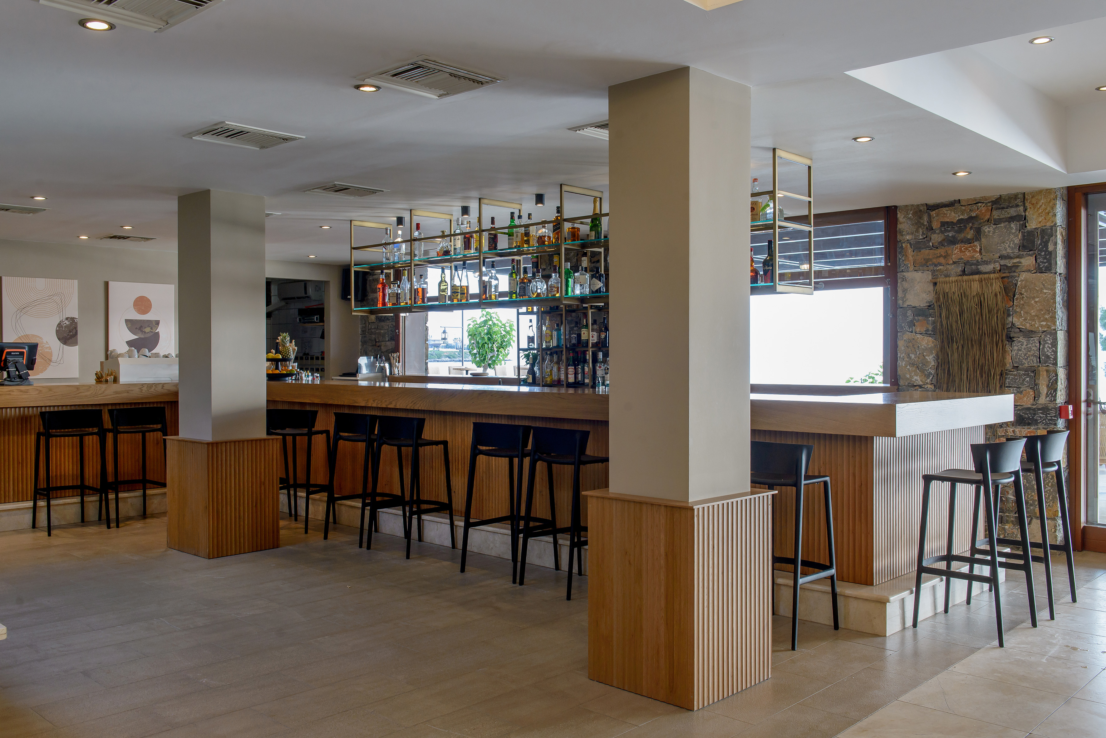 a bar with a shelf of liquor