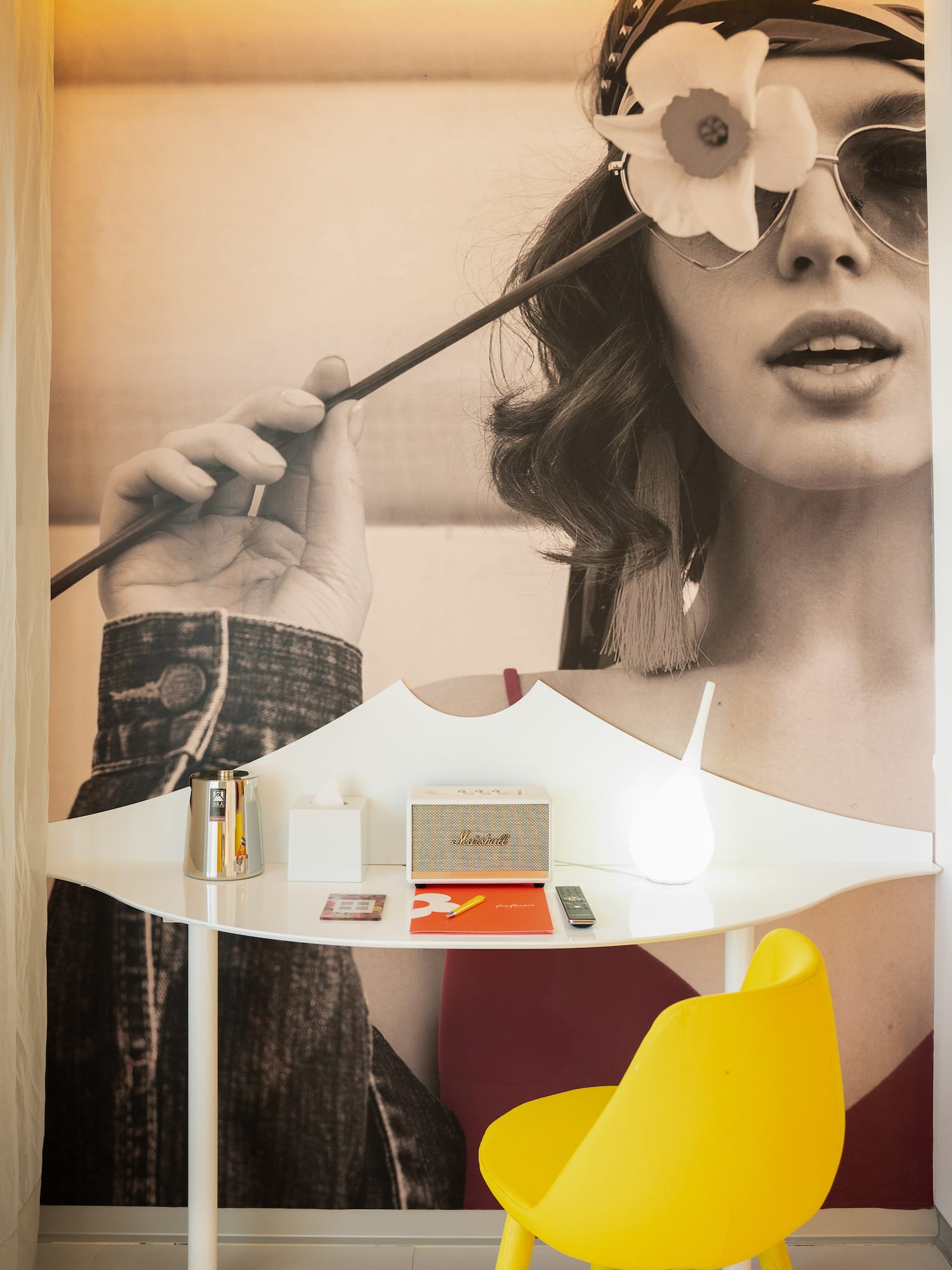 a poster of a woman holding a flower on a stick