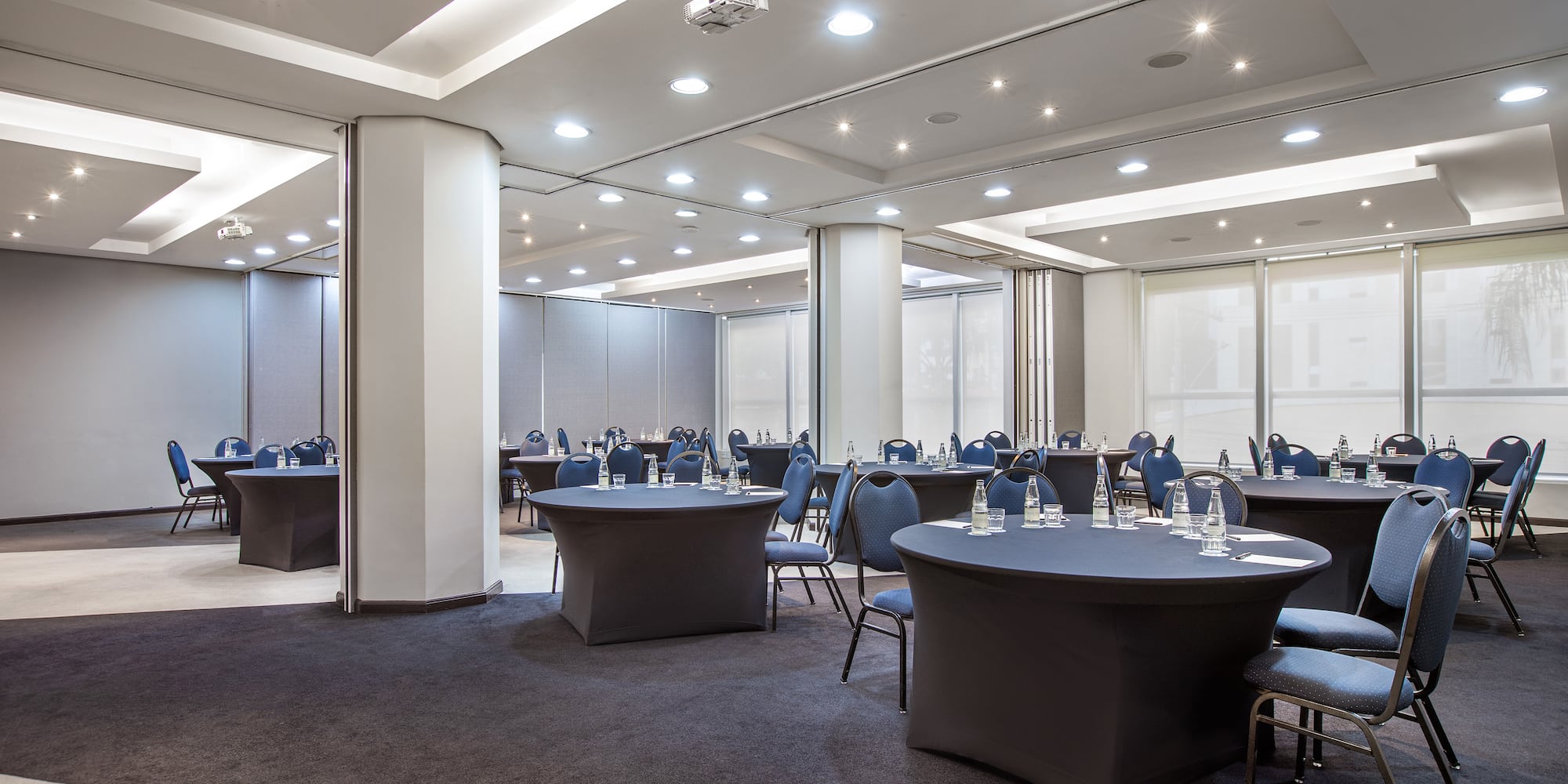 a room with tables and chairs