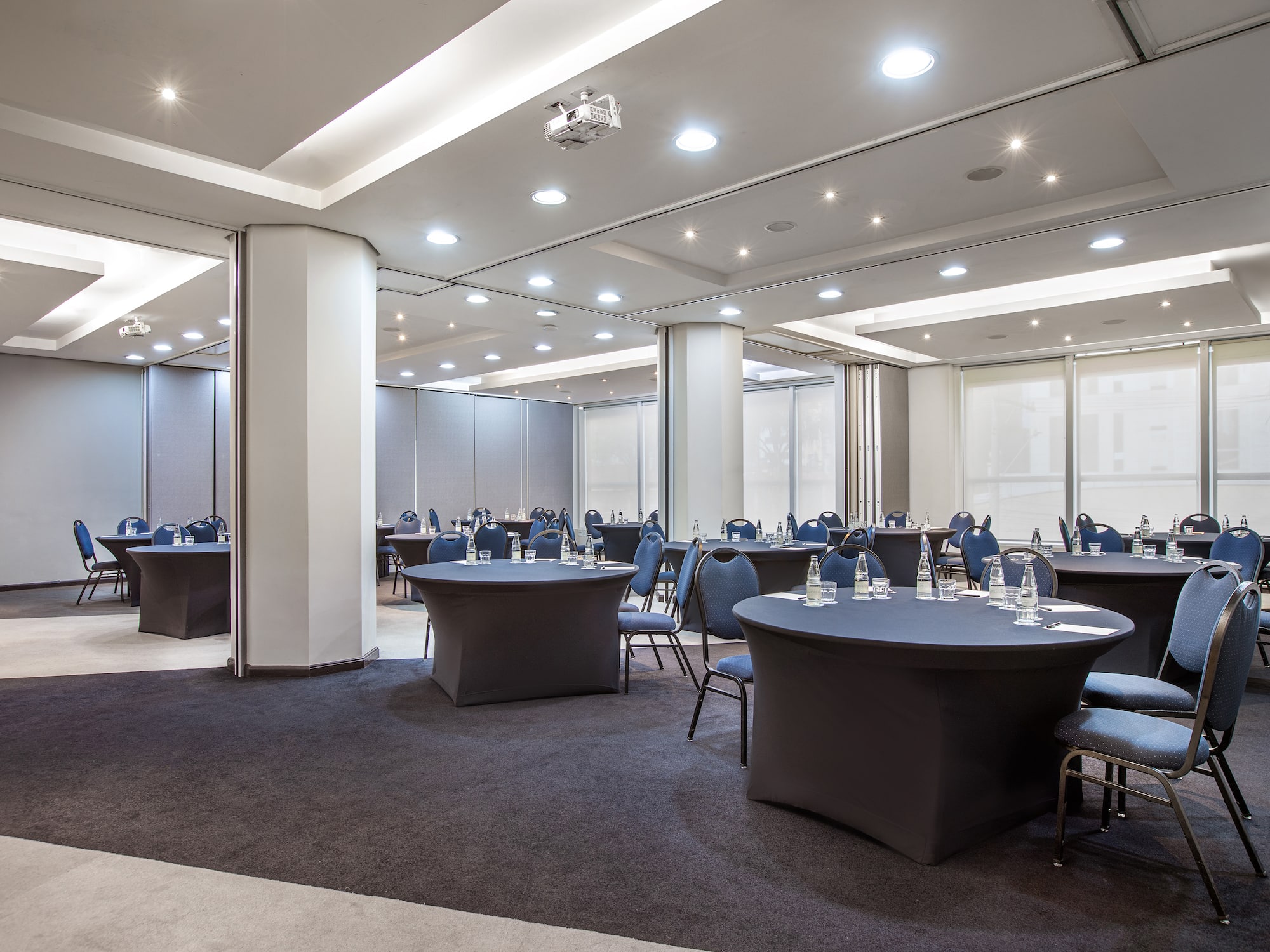 a room with tables and chairs