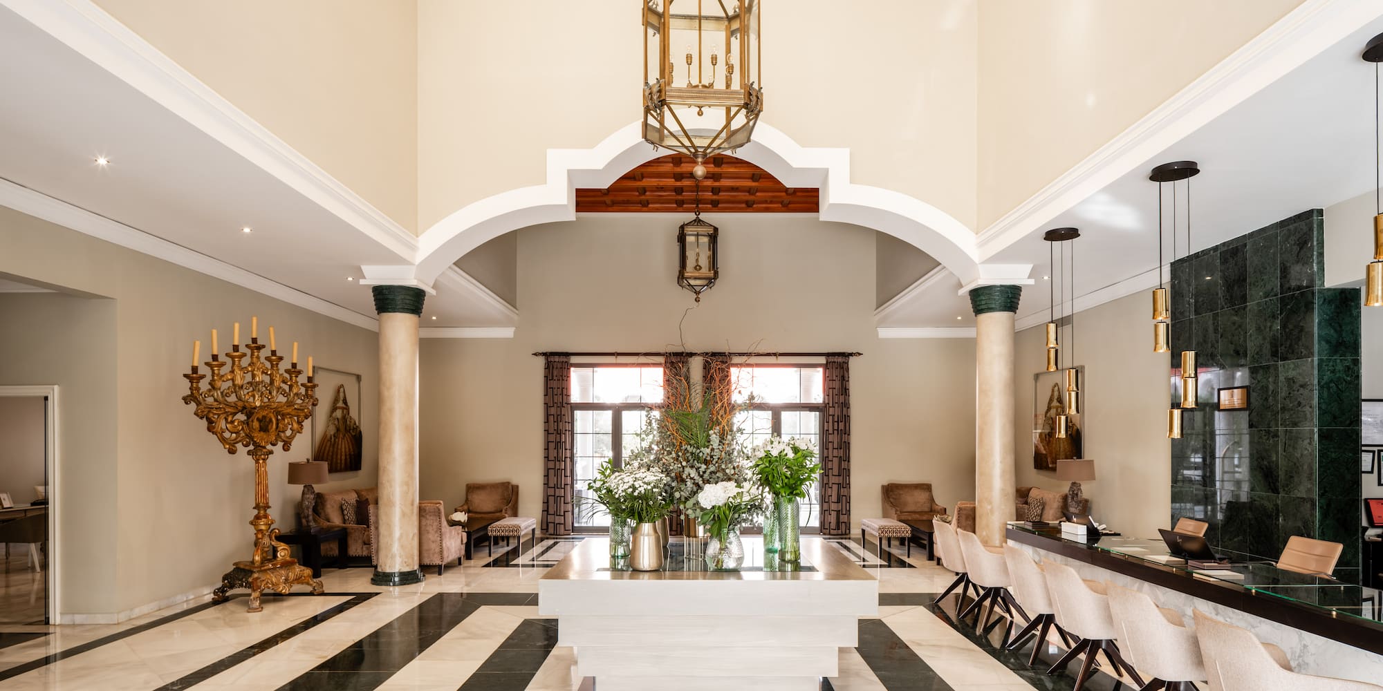 a room with a large table and chairs