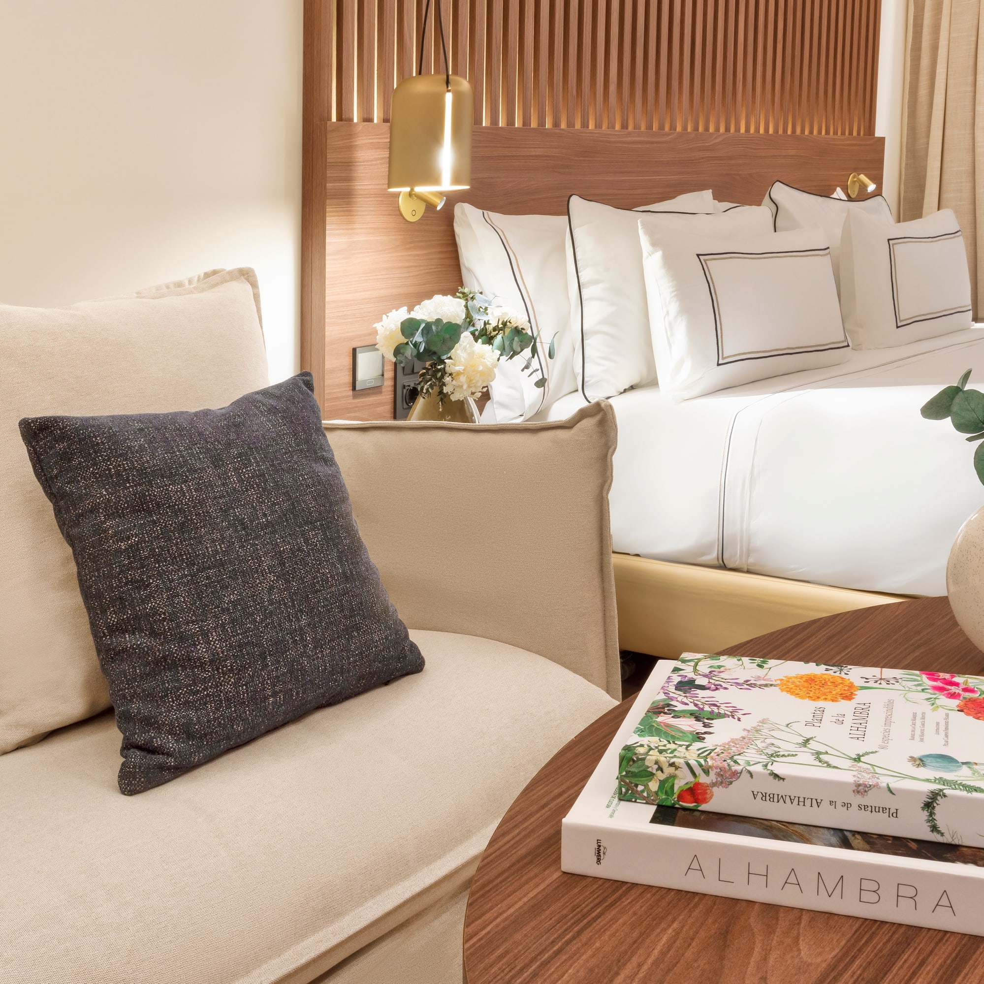 a couch and a book on a table