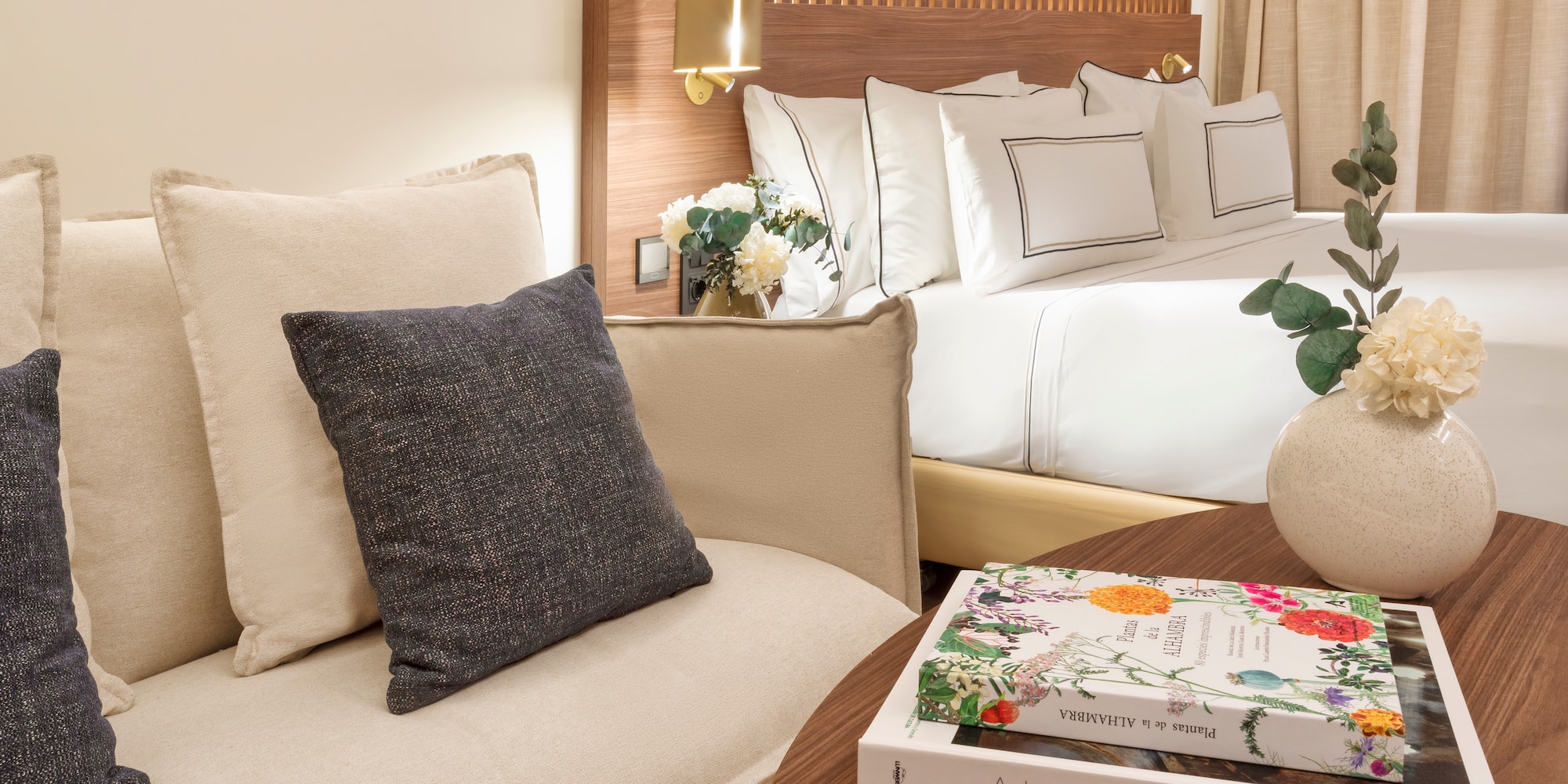 a couch and a book on a table