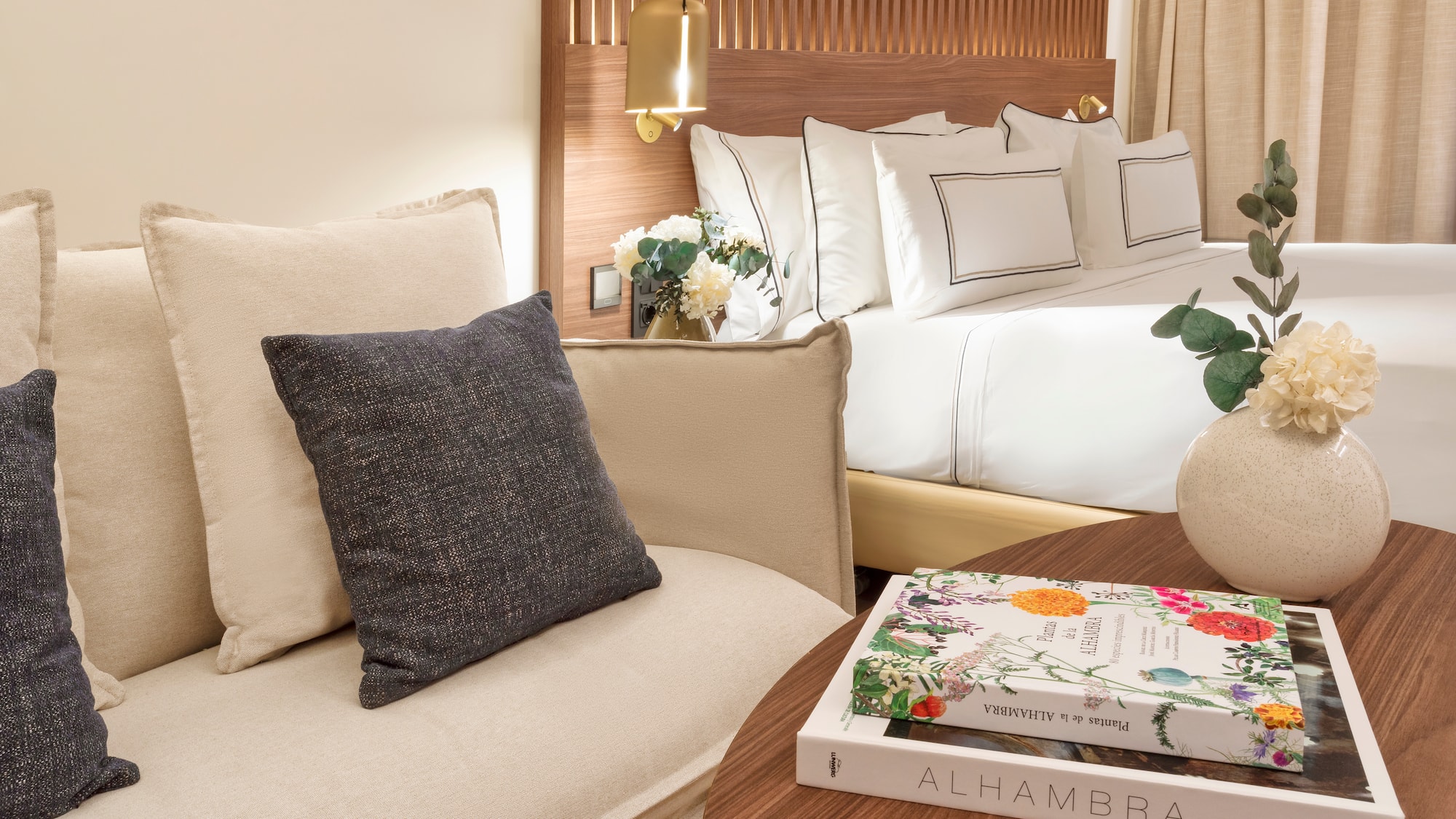 a couch and a book on a table