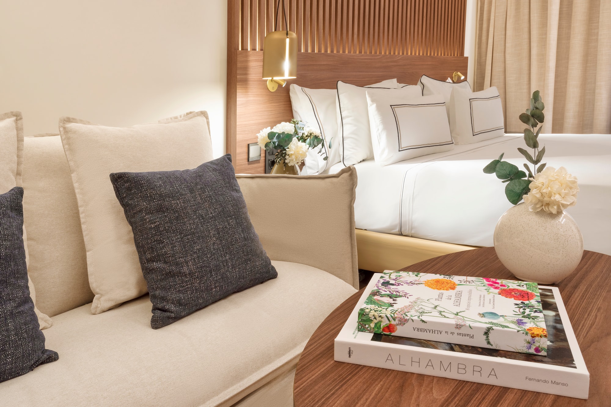 a couch and a book on a table