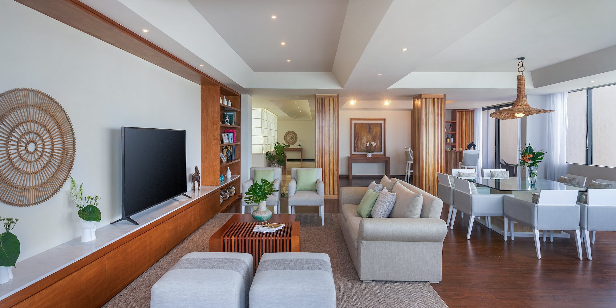 a living room with a television and a couch