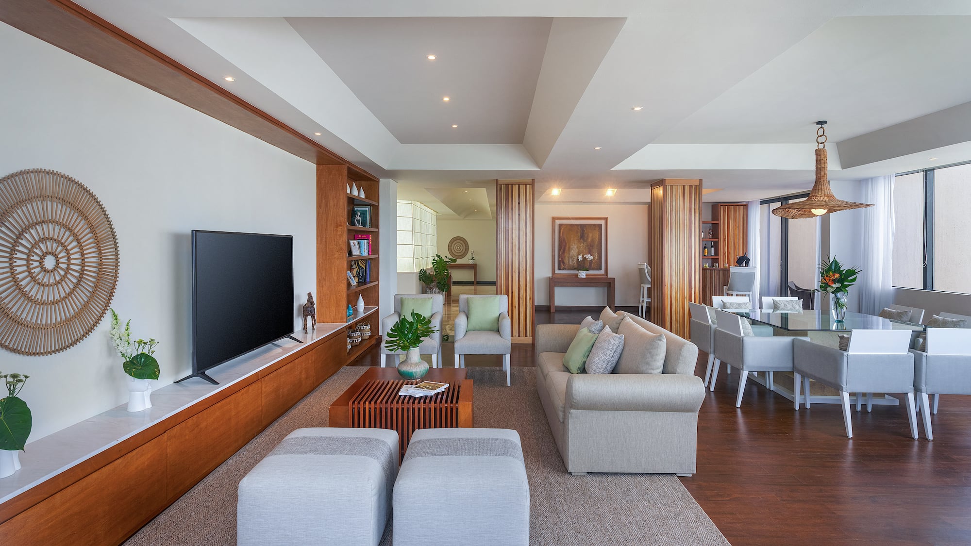 a living room with a television and a couch