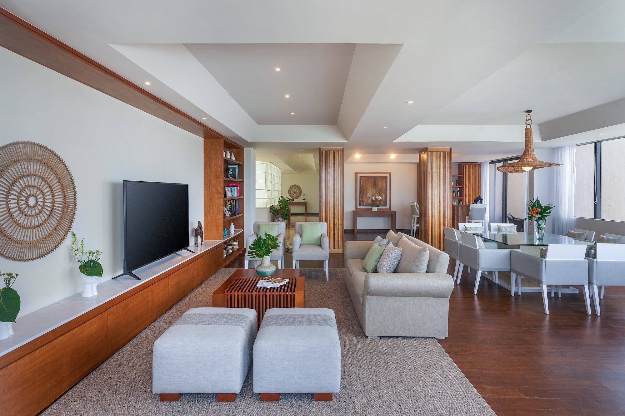 a living room with a television and a couch