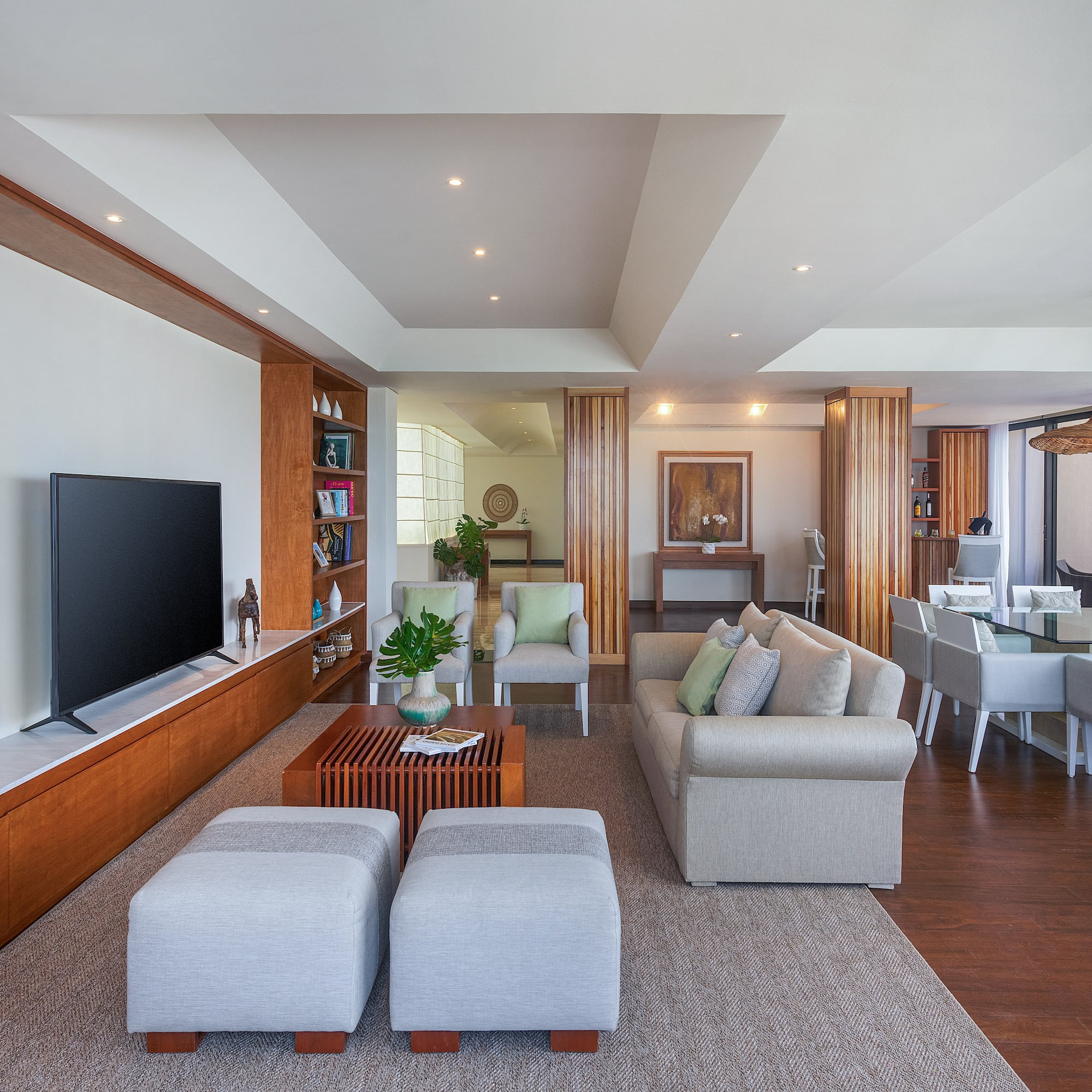 a living room with a television and a couch