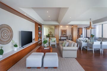 a living room with a television and a couch