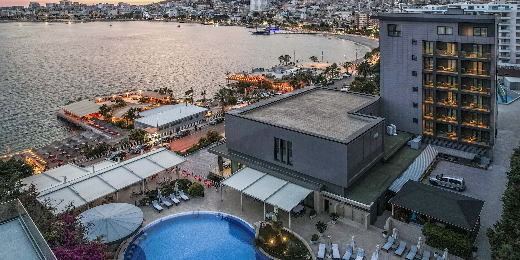 a swimming pool next to a building