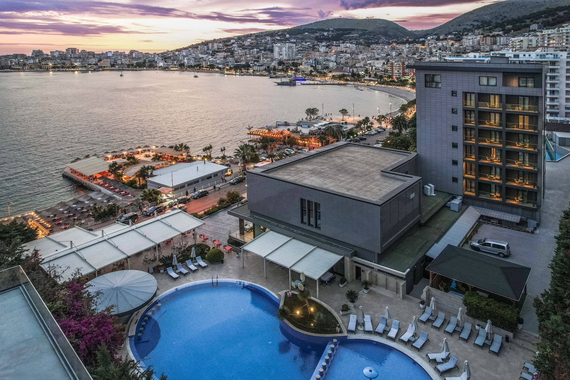 a swimming pool next to a building