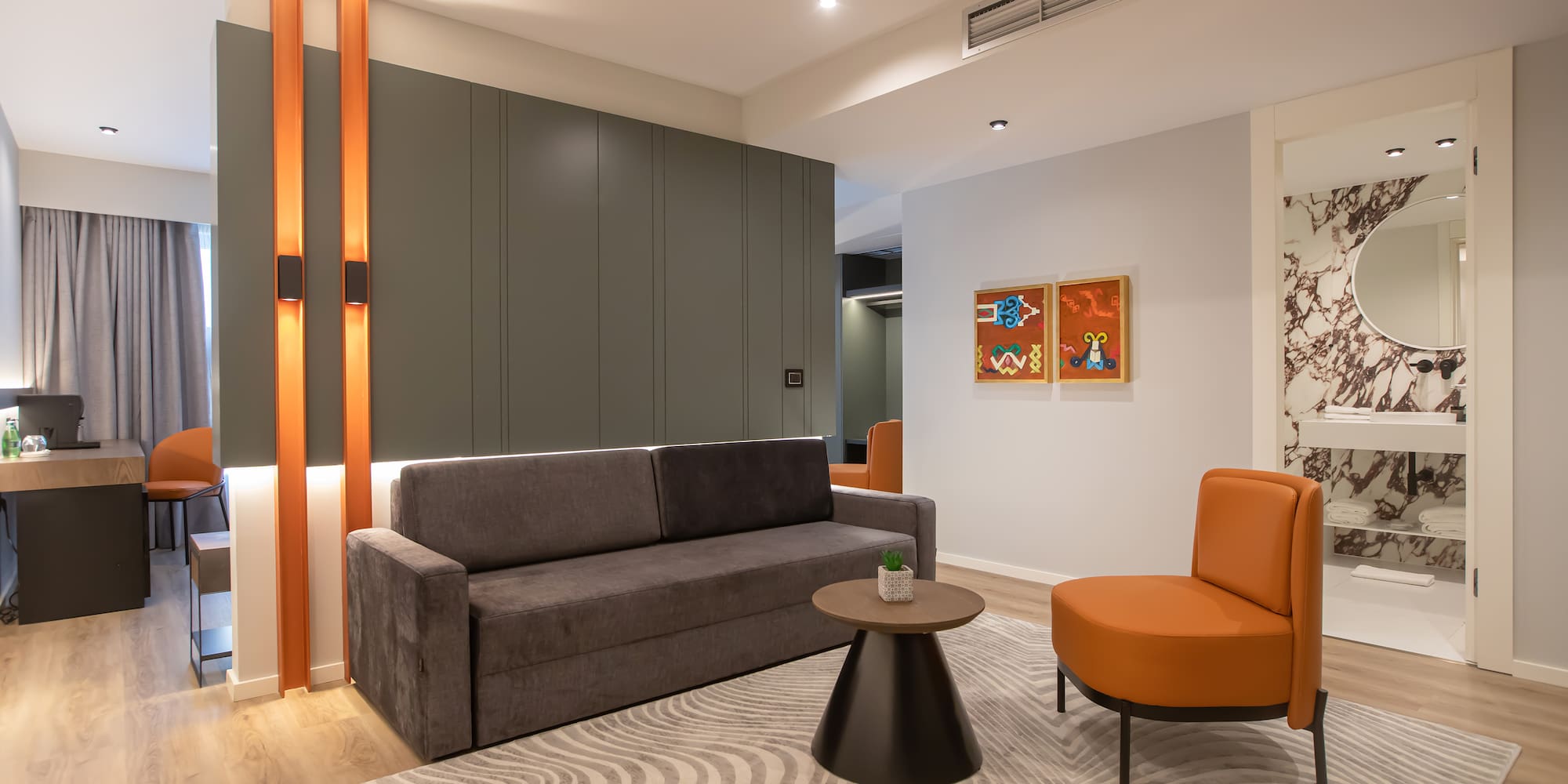 a living room with a couch and a table