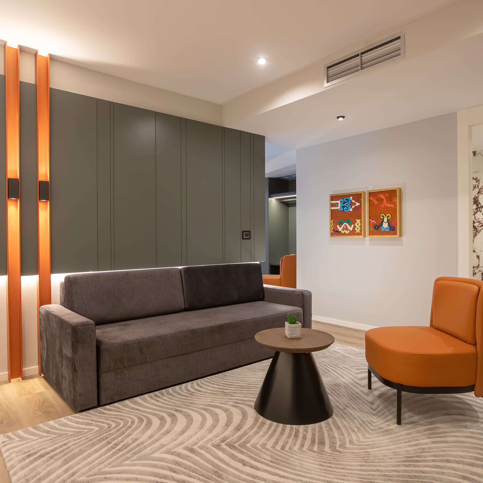 a living room with a couch and a table