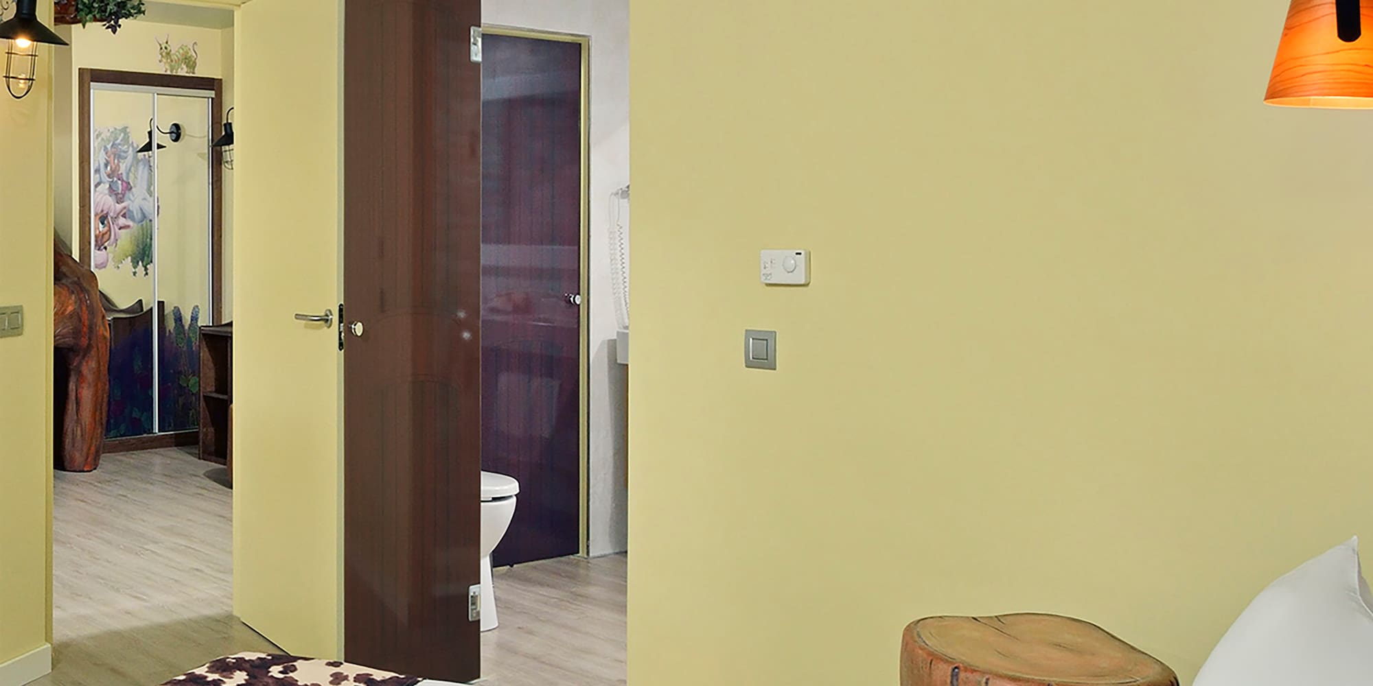 a bedroom with a bed and a door