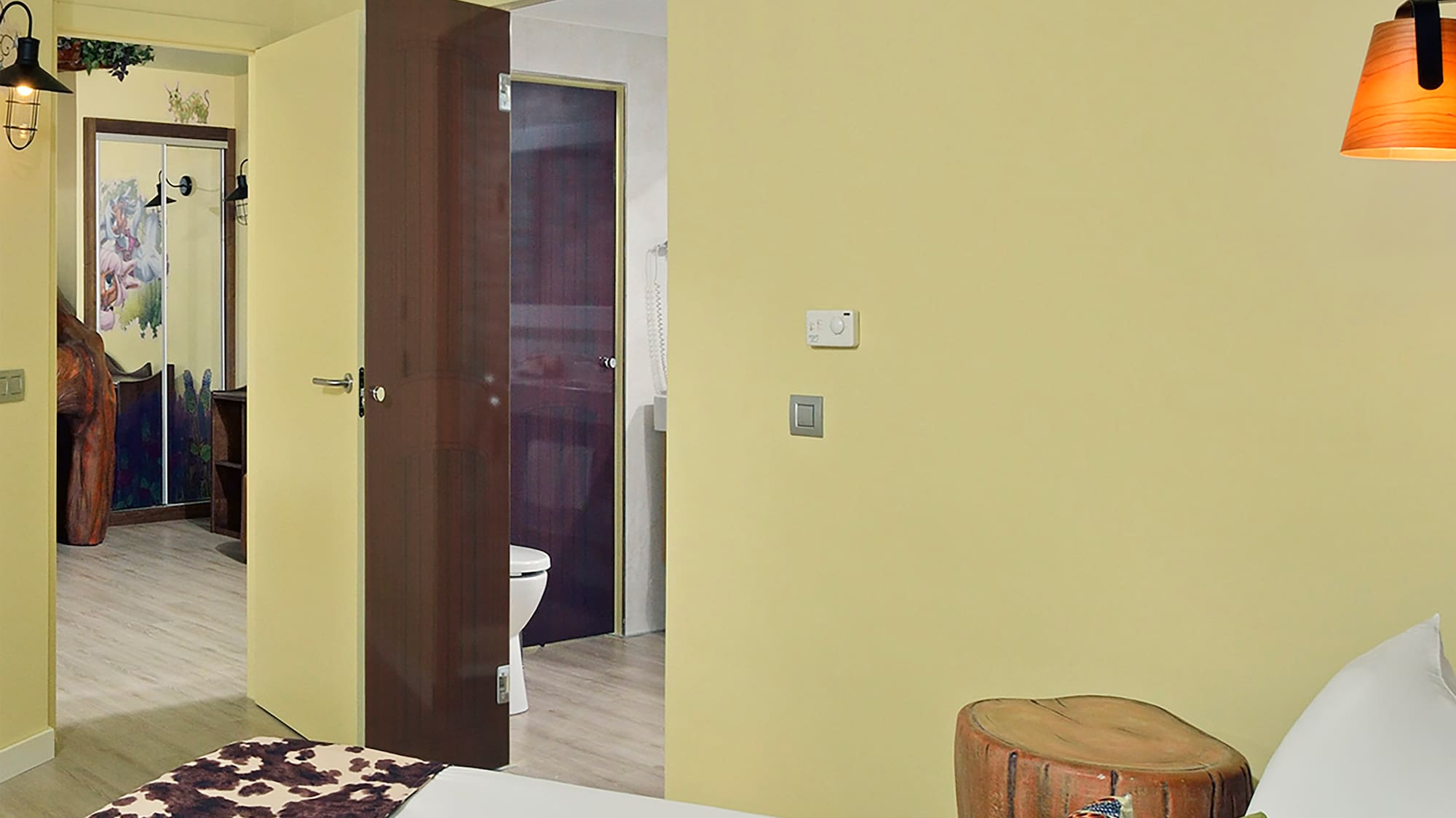 a bedroom with a bed and a door