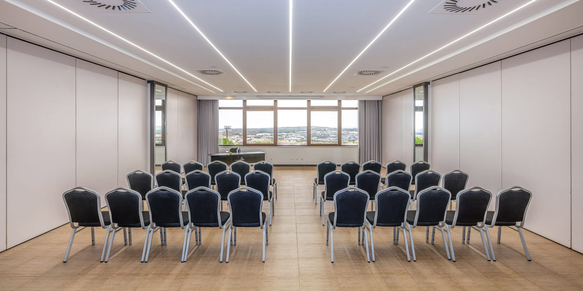 a room with chairs and a table