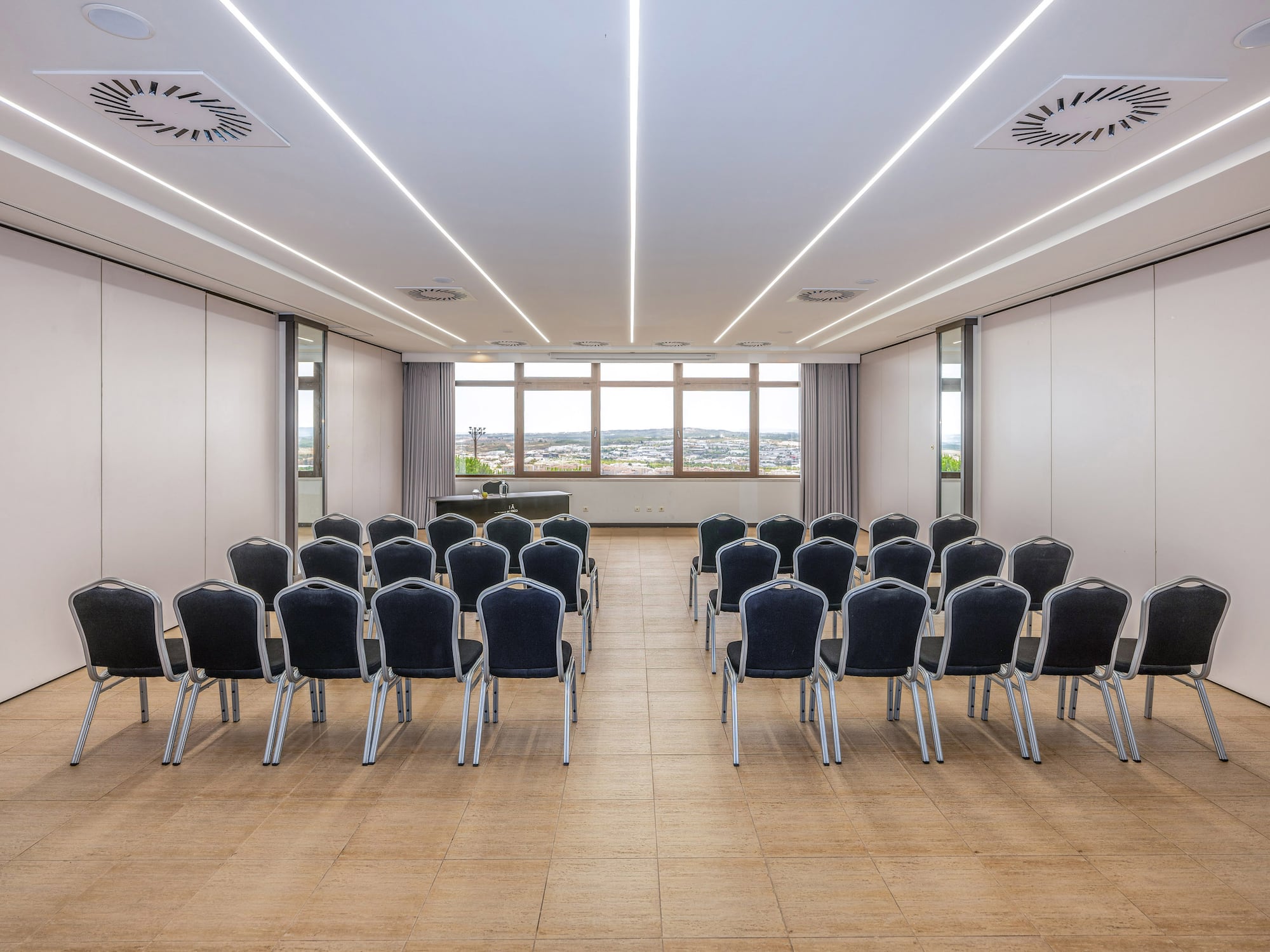a room with chairs and a table