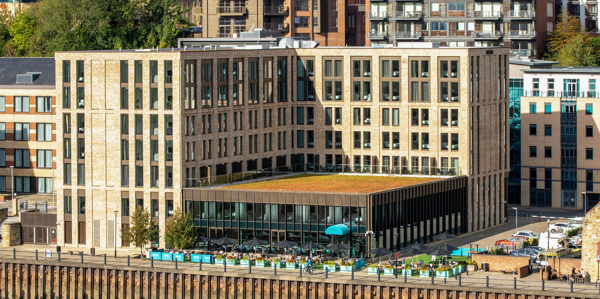 a city with many buildings and a body of water