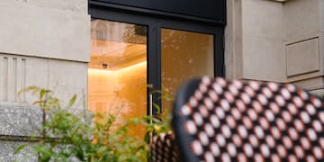 a chair outside of a restaurant