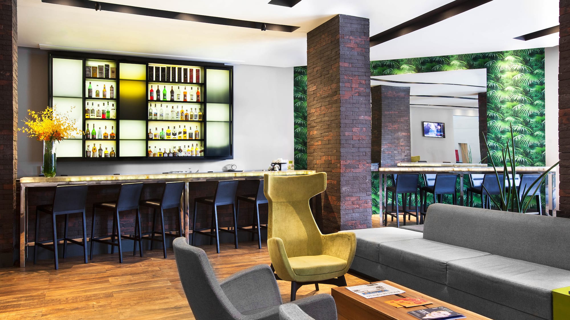 a room with a bar and a couch