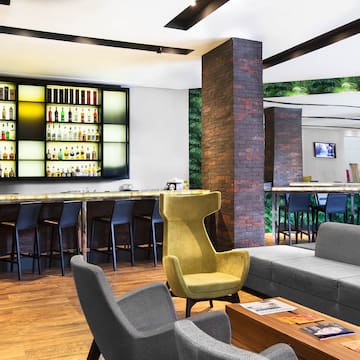 a room with a bar and a couch