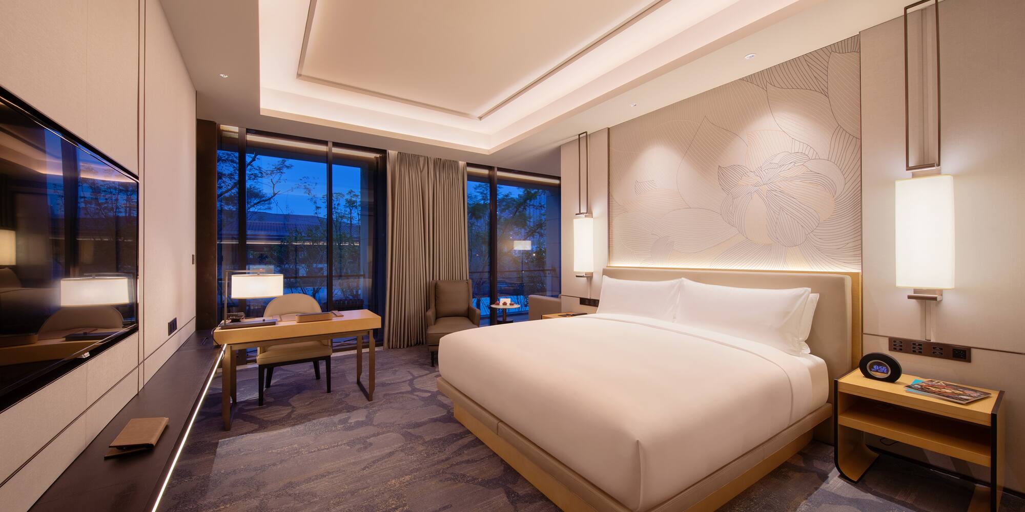 a room with a bed and a desk