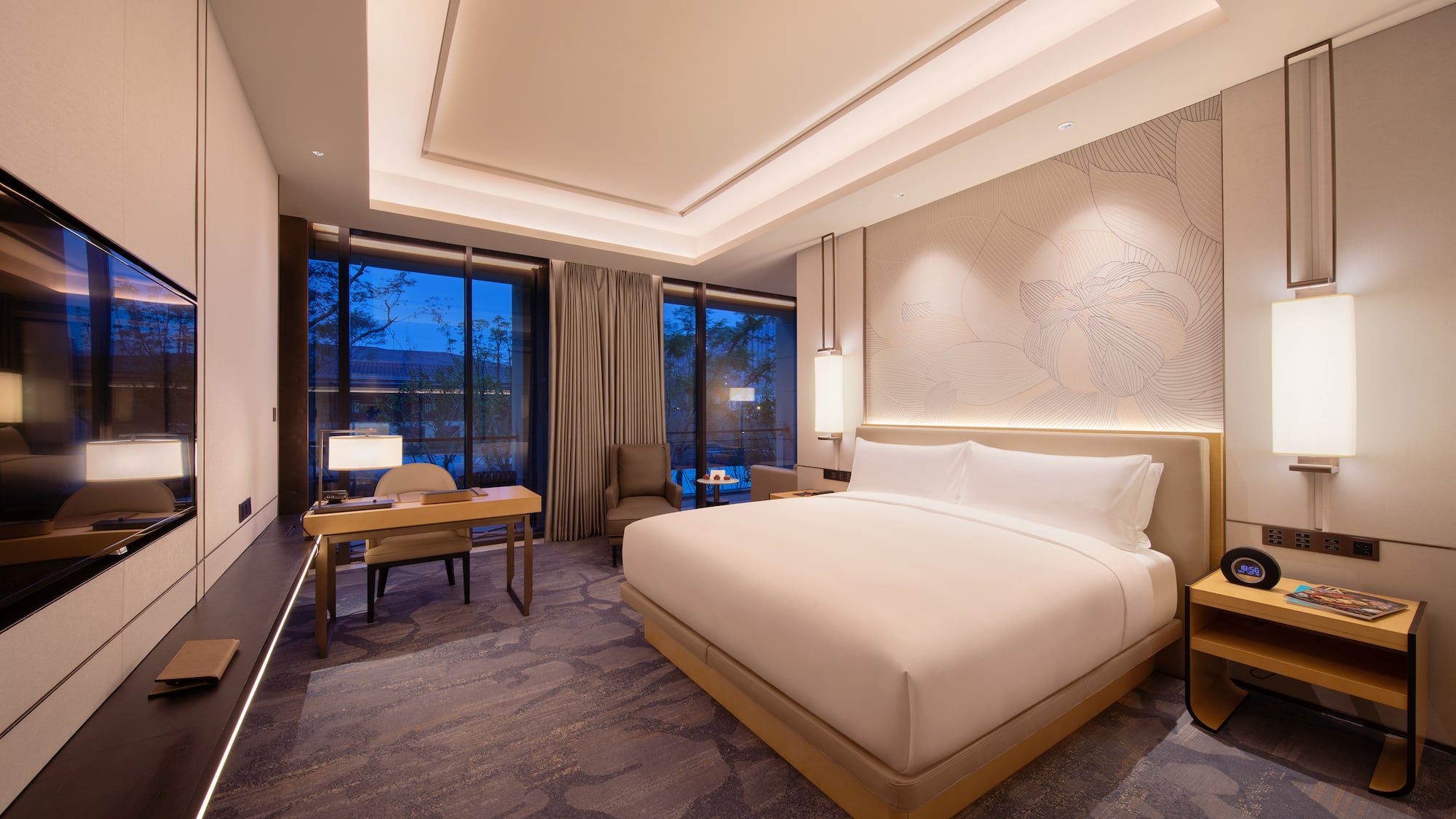 a room with a bed and a desk