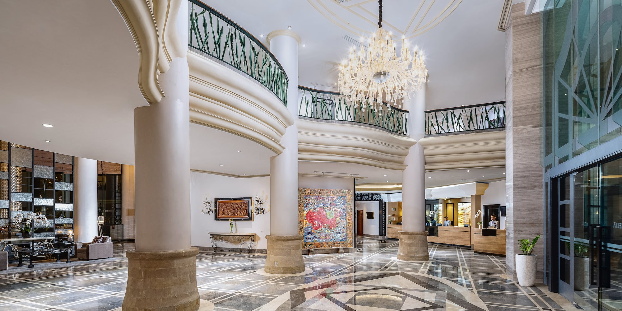 a large building with columns and a chandelier