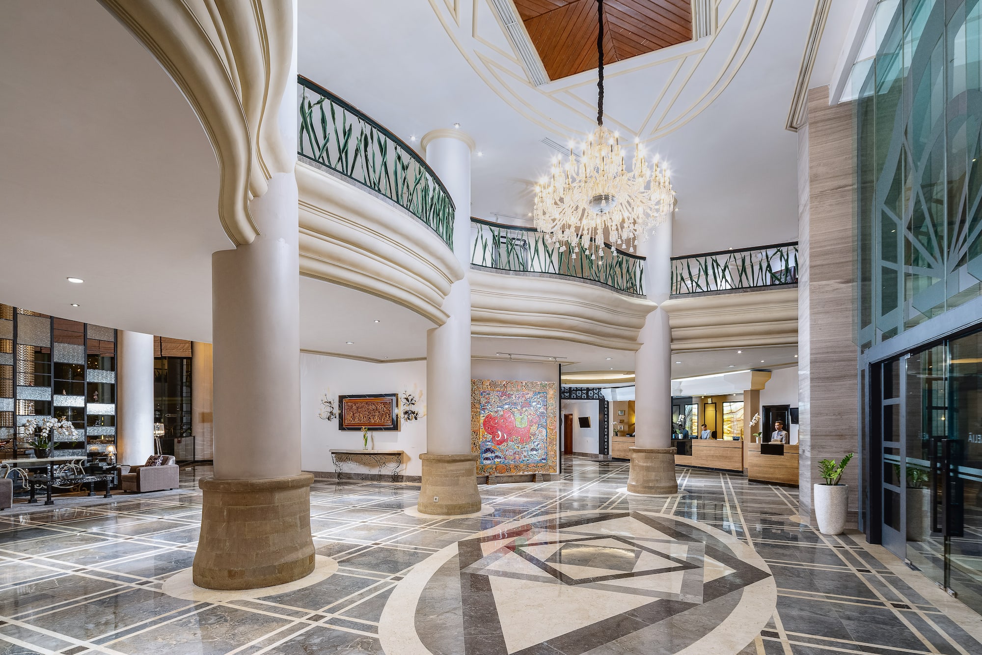 a large building with columns and a chandelier