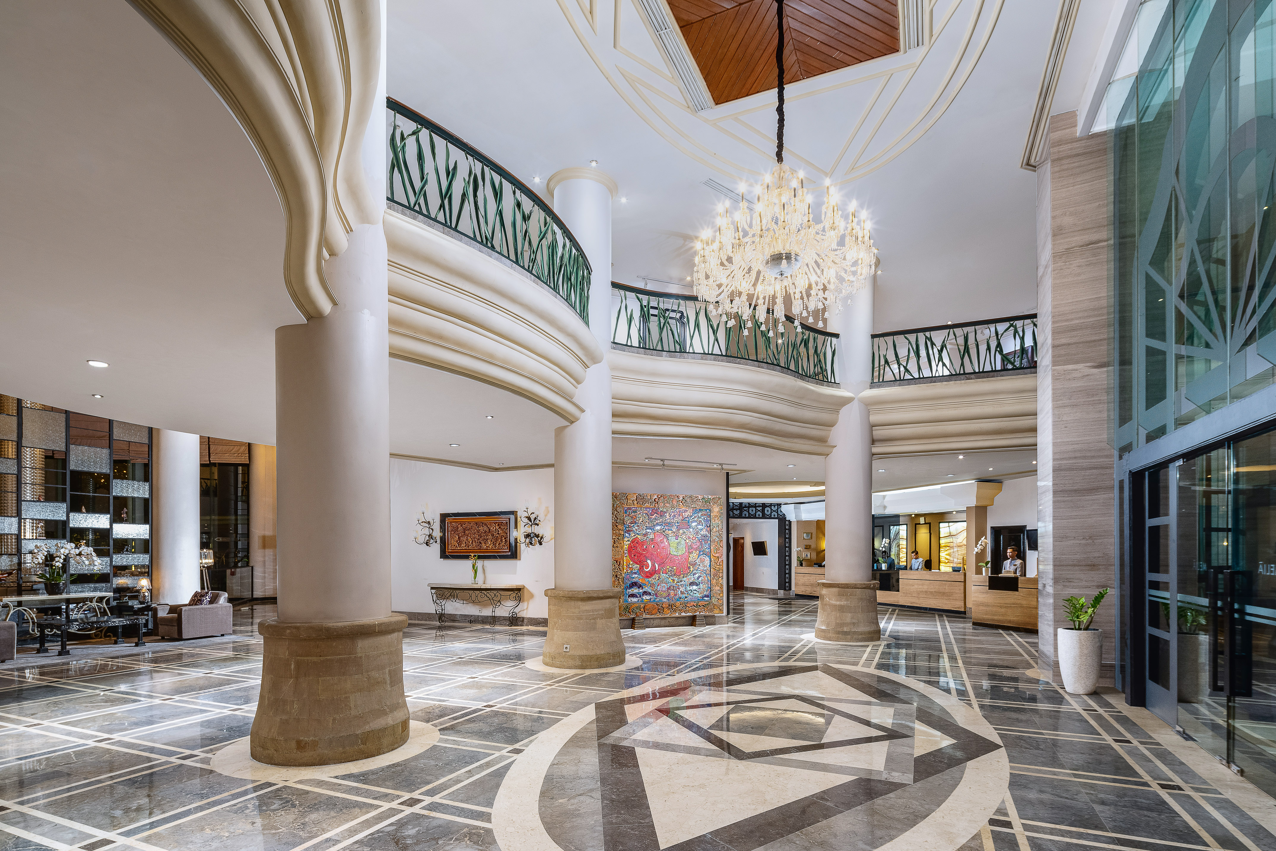 a large building with columns and a chandelier