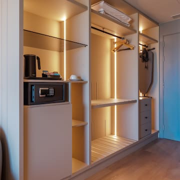 a room with a closet and a door