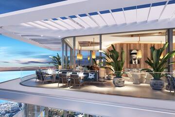 a restaurant with a view of the ocean