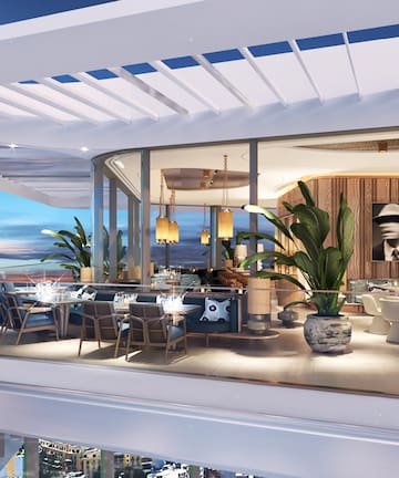 a restaurant with a view of the ocean