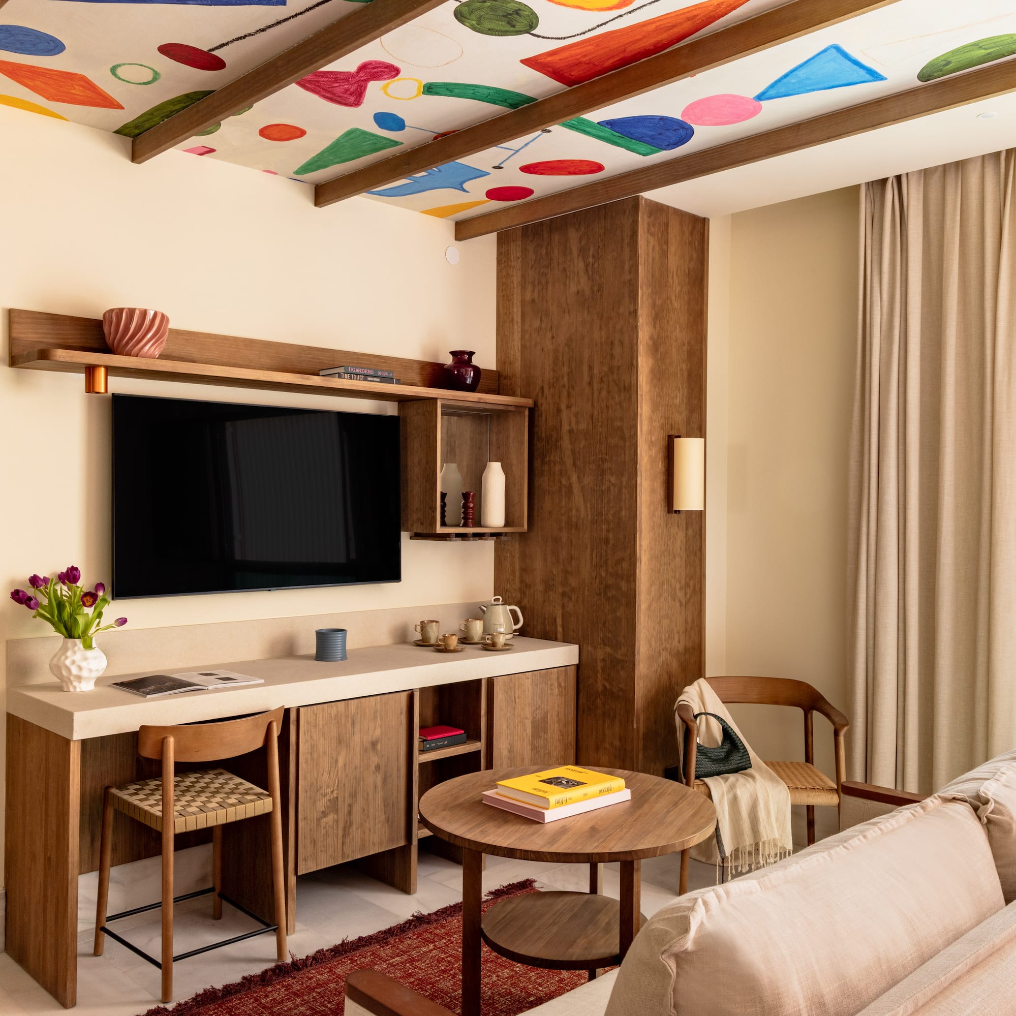 a living room with a tv and a couch