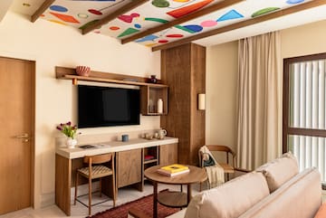 a living room with a tv and a couch