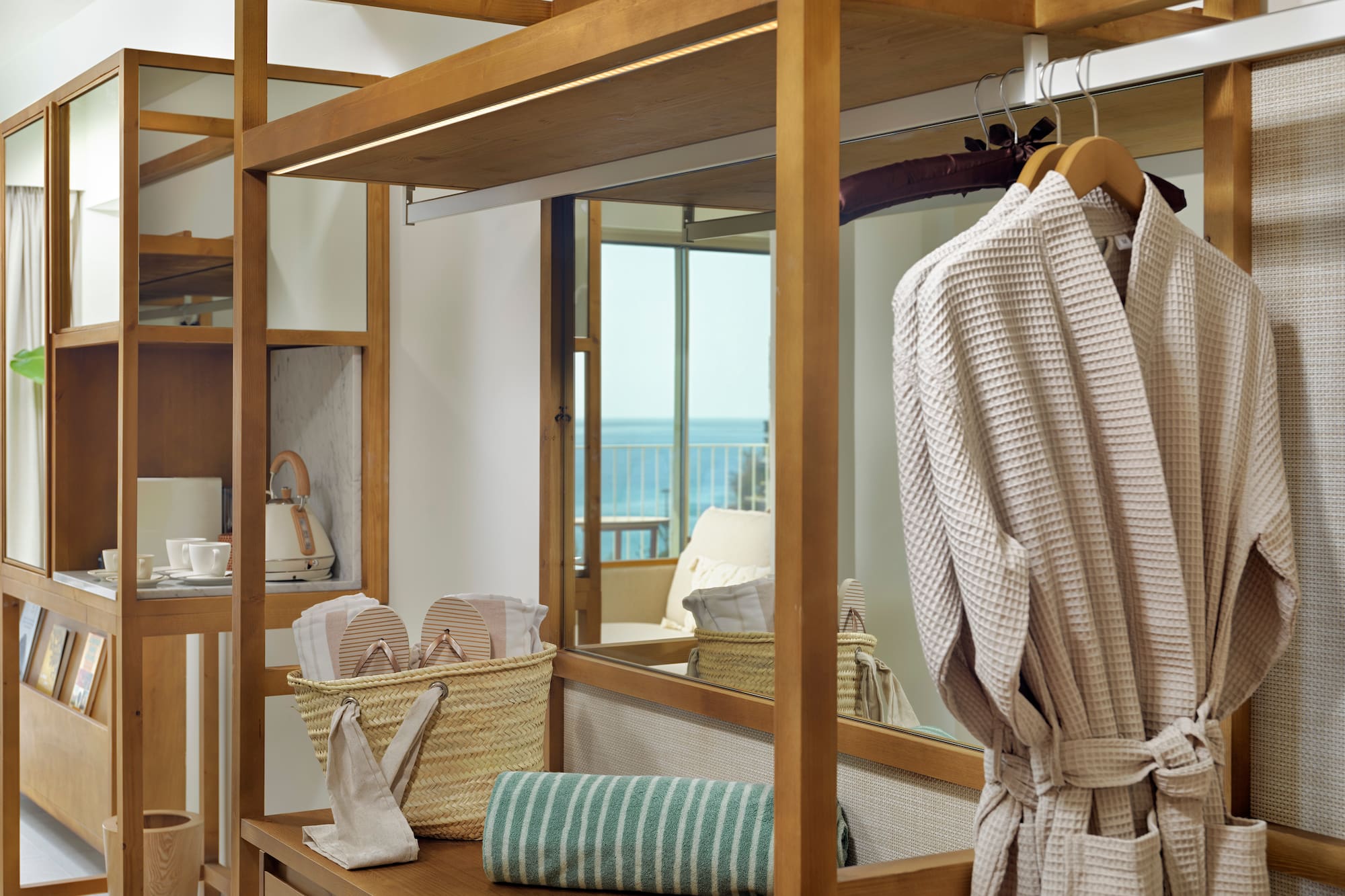 a room with a towel rack and towels