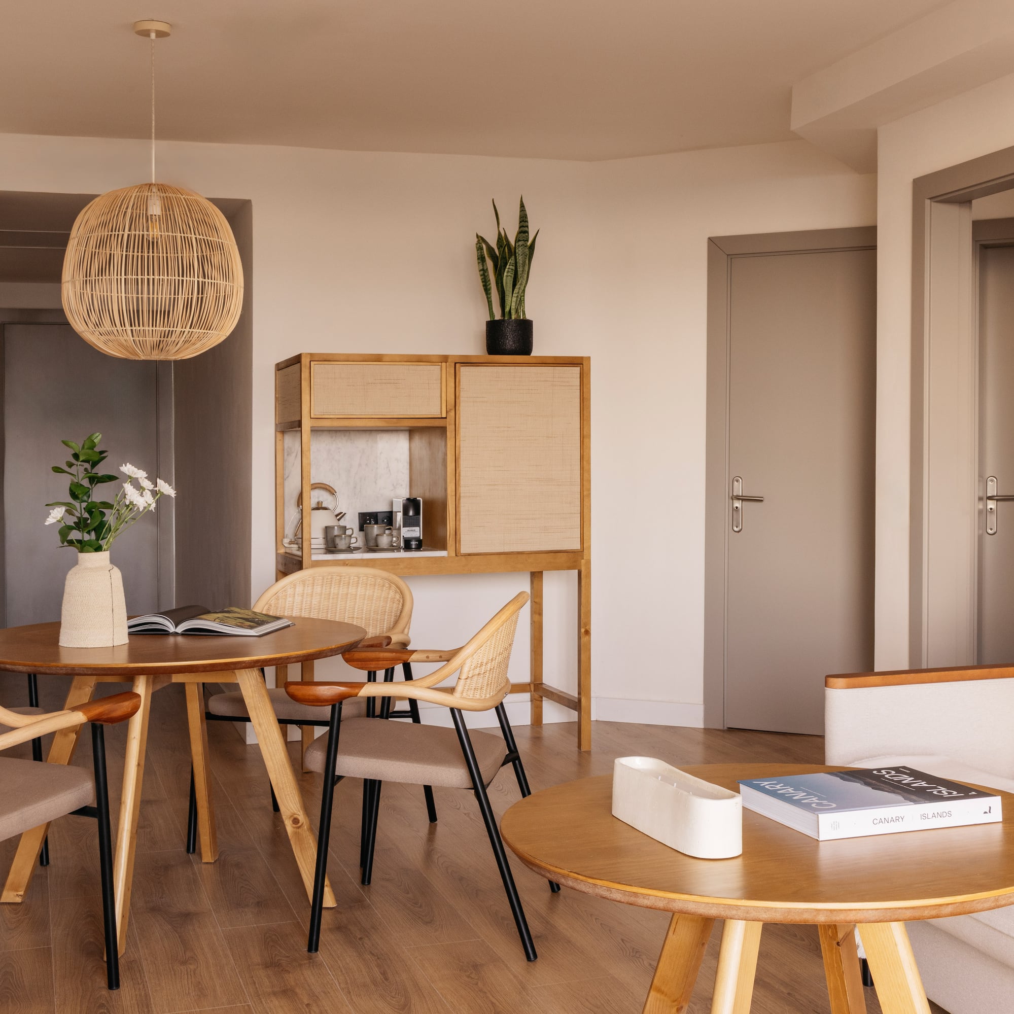 a room with a table and chairs