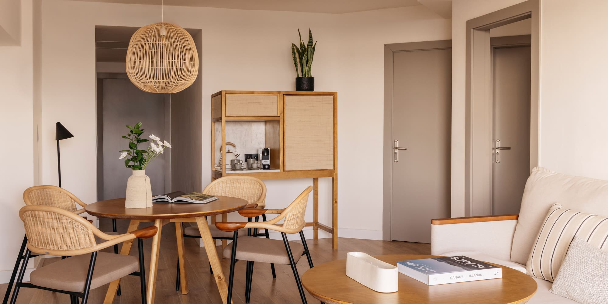 a room with a table and chairs