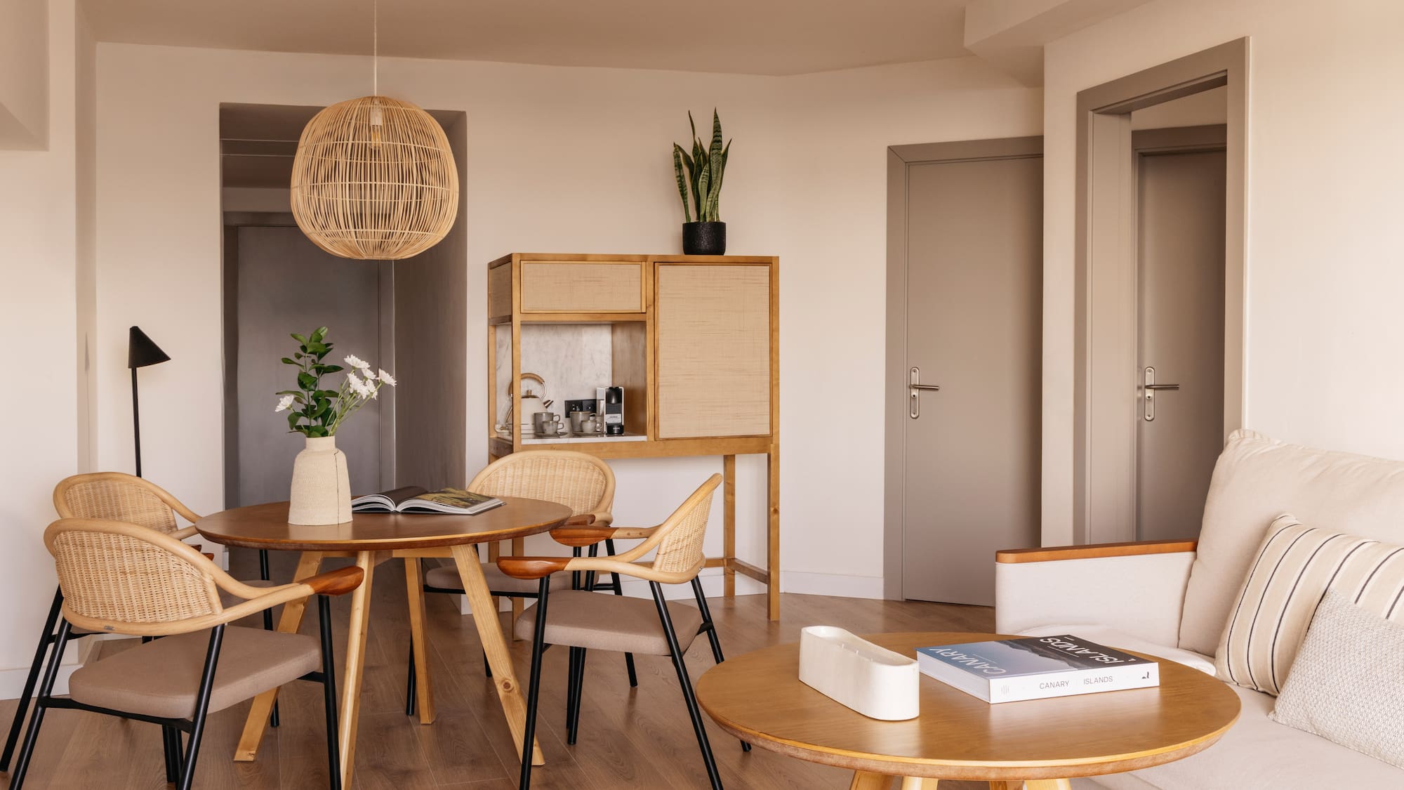 a room with a table and chairs