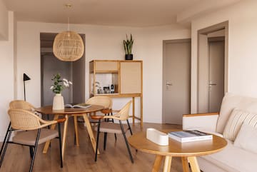 a room with a table and chairs