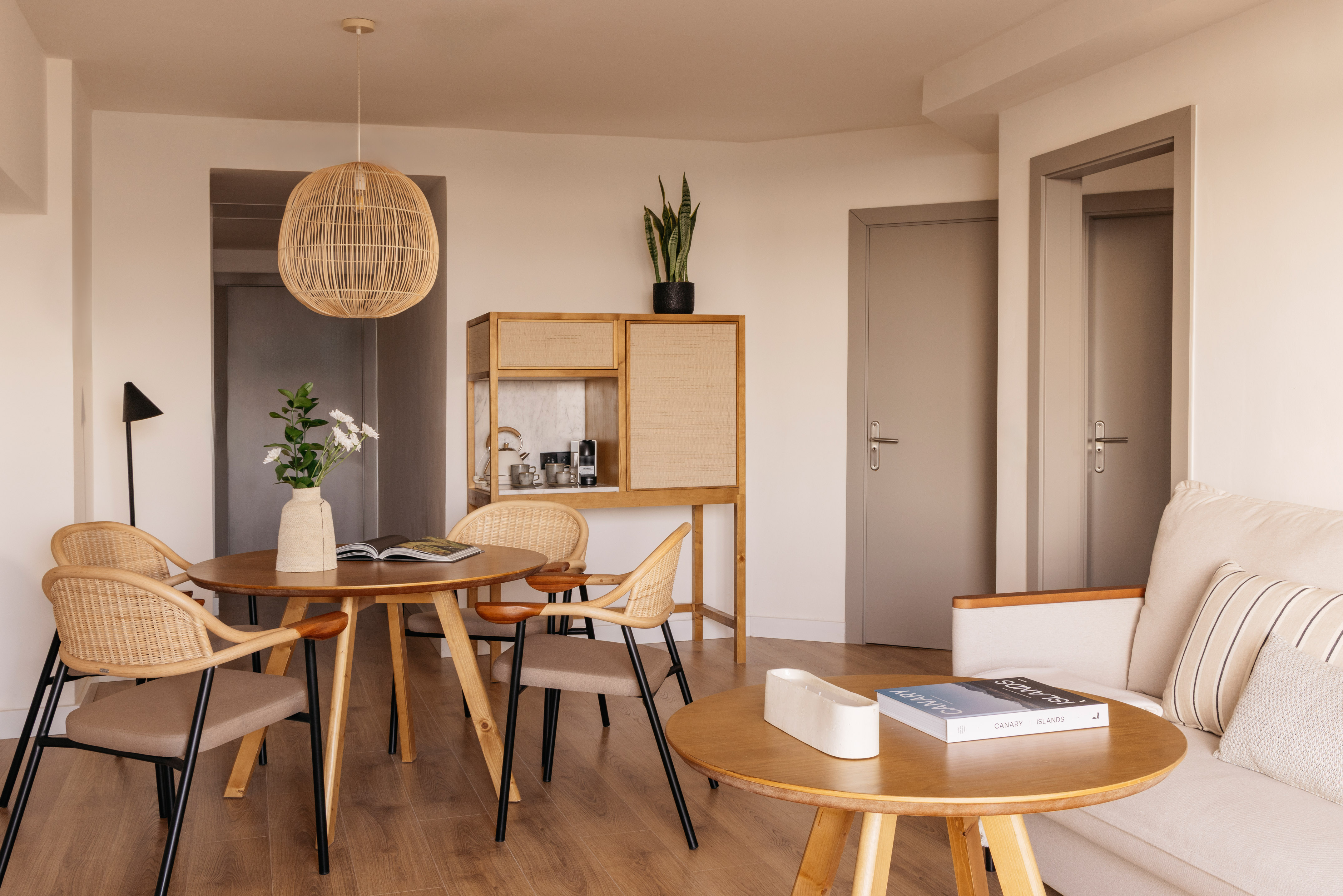 a room with a table and chairs