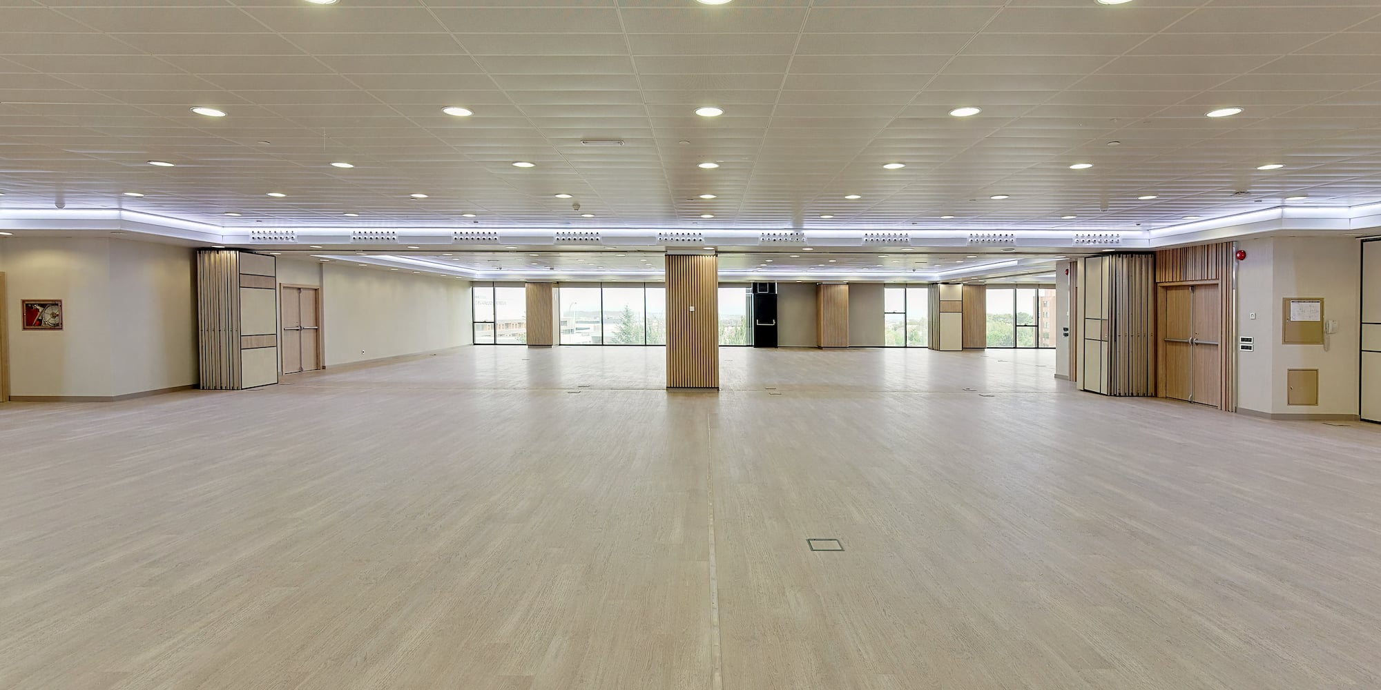 a large room with a wood floor