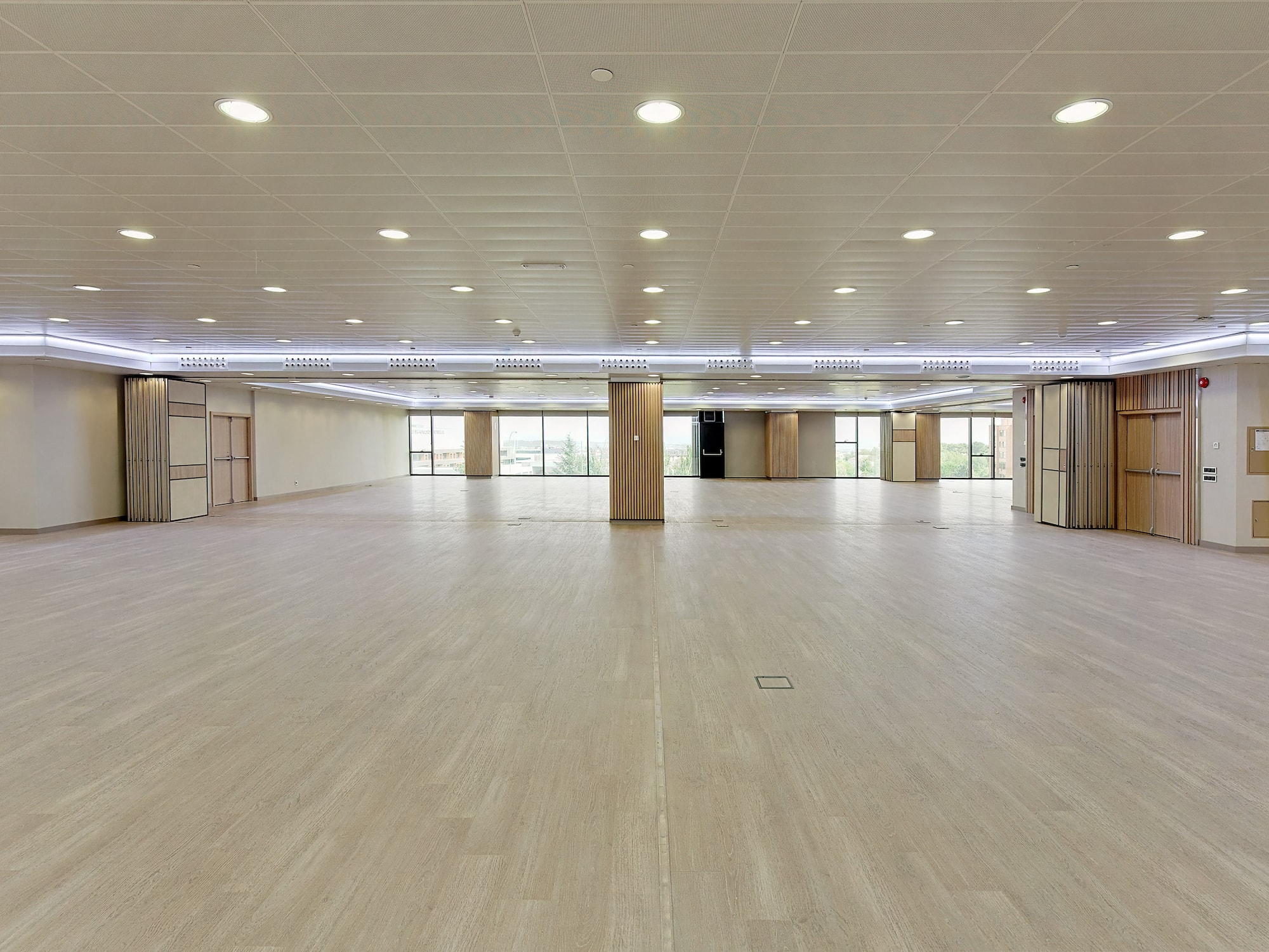 a large room with a wood floor