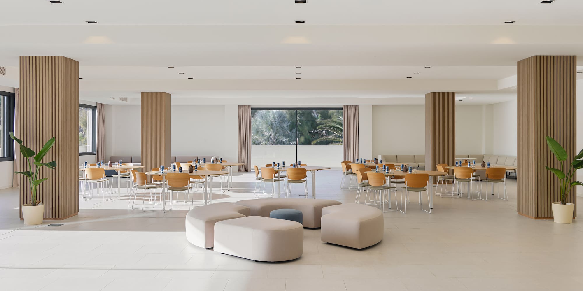 a large room with tables and chairs