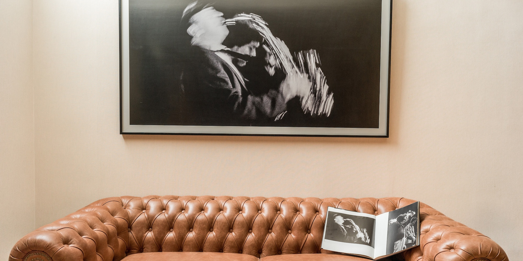 a couch with a picture on the wall