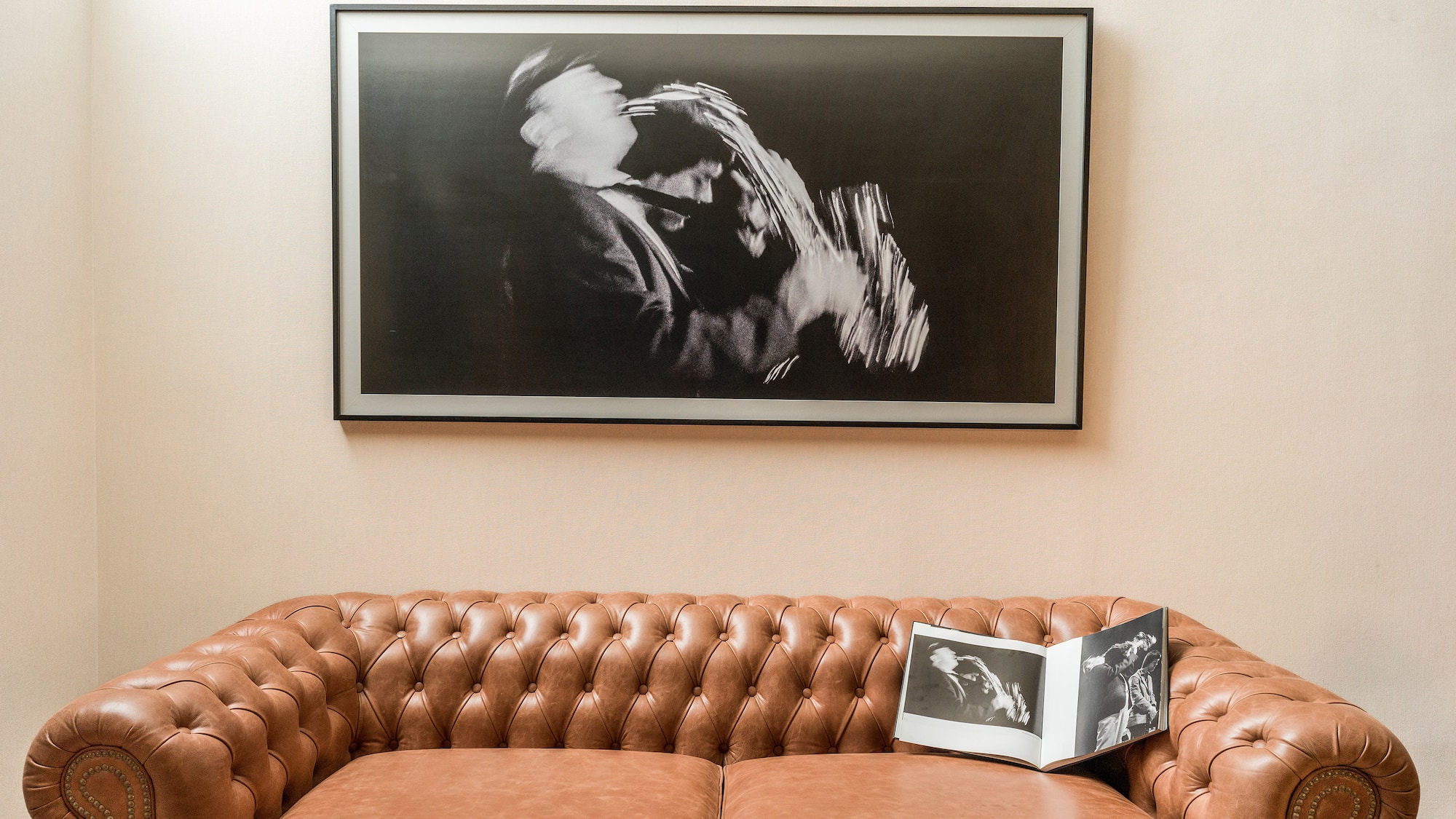 a couch with a picture on the wall