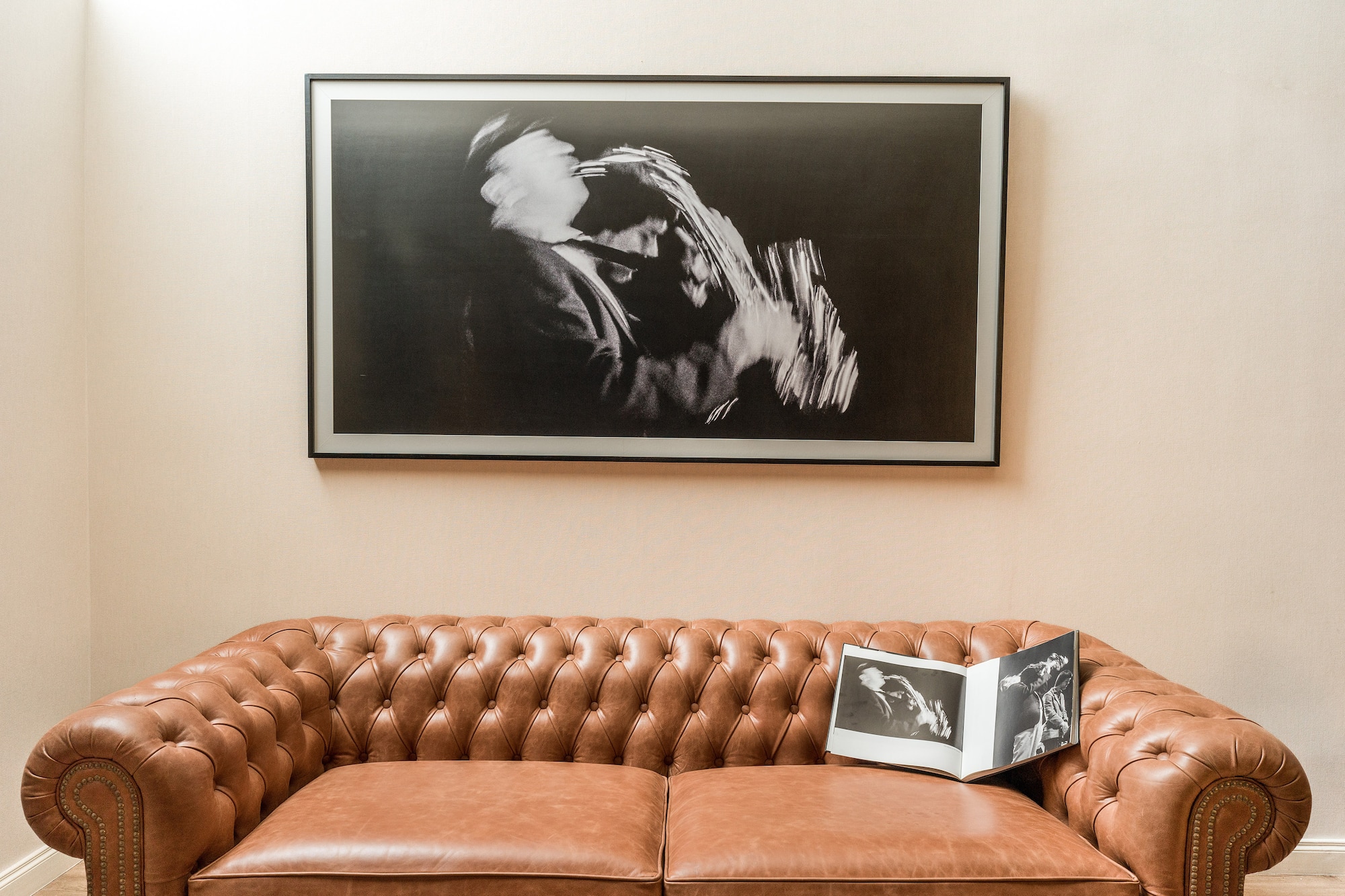 a couch with a picture on the wall
